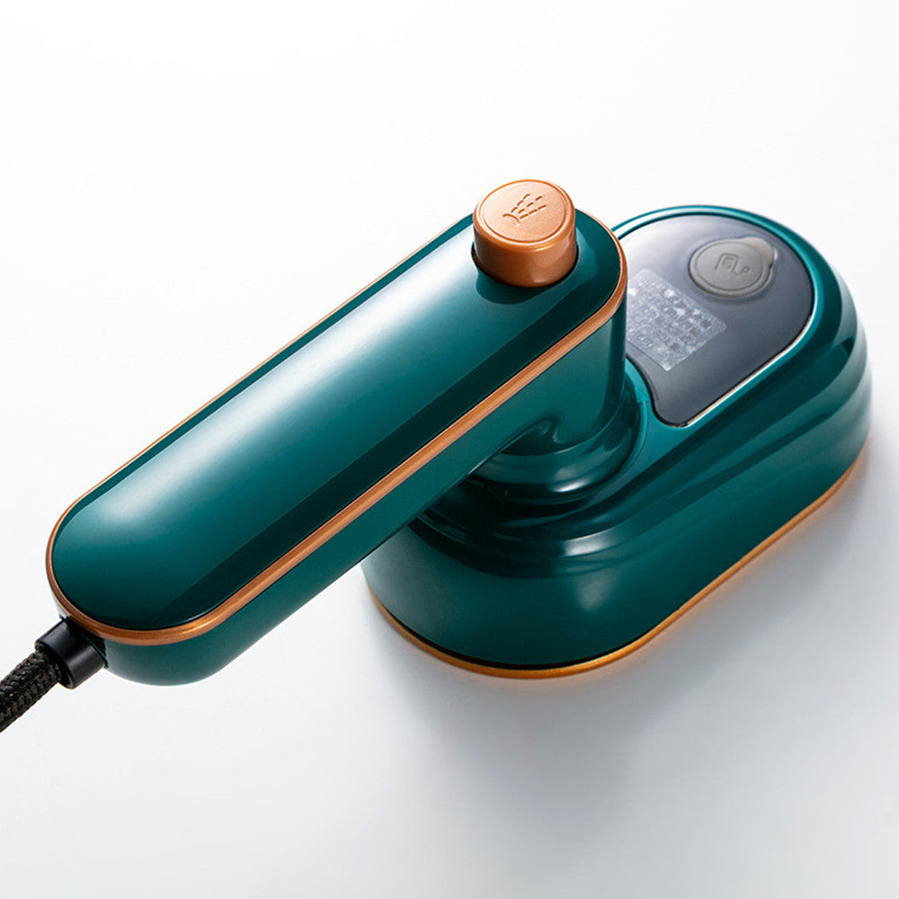 Gros plan sur la qualité de fabrication de l'appareil défroisseur à vapeur couleur vert brillant