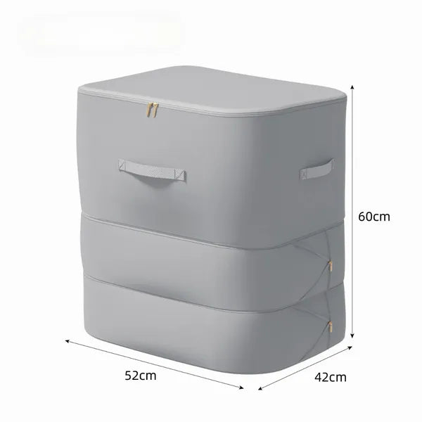 Un sac de compression couleur grise est montré sur un fond blanc avec ses dimensions représentées en centimètres