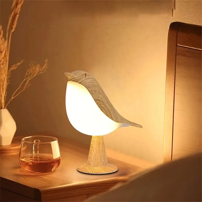 Lampe led en forme d'oiseau allumée diffusant une lumière douce pour une ambiance chaleureuse