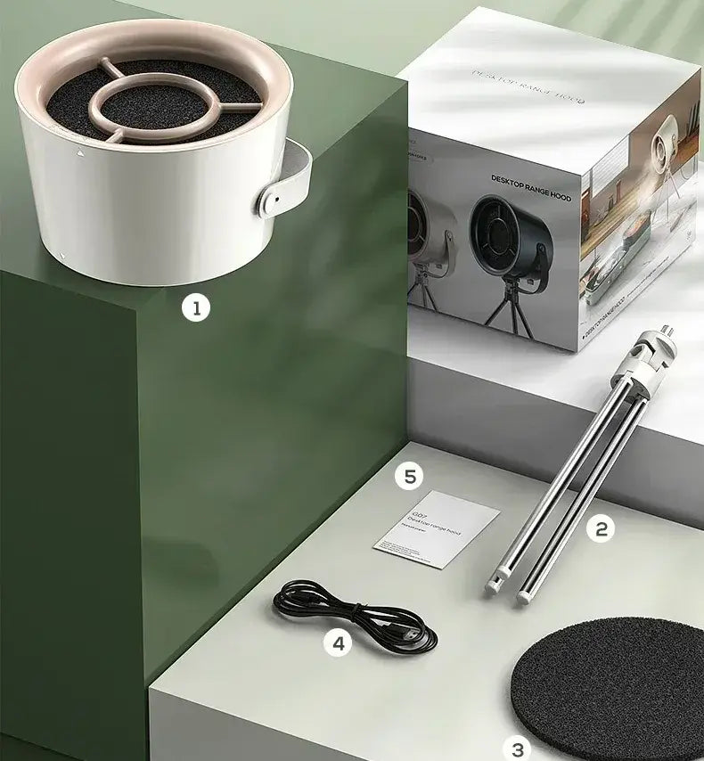 Présentation des différents accessoires présents dans la boite de la petite hotte de cuisine