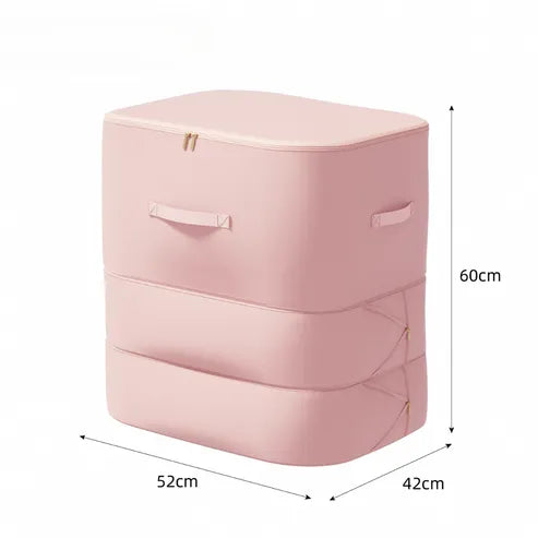 Un grand sac de rangement XXL système de compression couleur rose est exposé sur un fond blanc avec ses dimensions écrites
