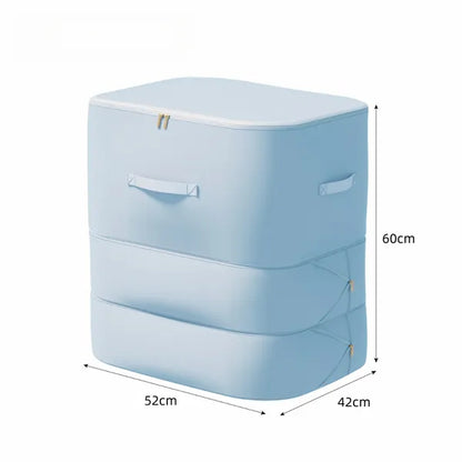 Un sac de compression couleur bleue est montré sur un fond blanc avec ses dimensions représentées en centimètres