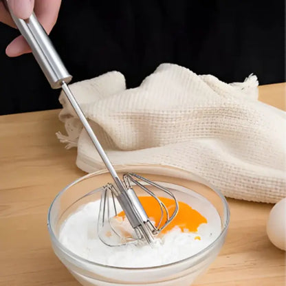 Fouet de cuisine rotatif en acier inoxydable